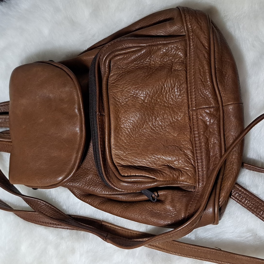 Cute small backpack it's brown